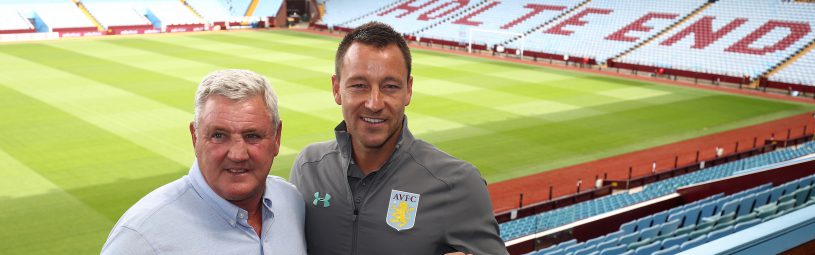 New Aston Villa signing John Terry with manager Steve Bruce during the press conference at Villa Park, Birmingham.