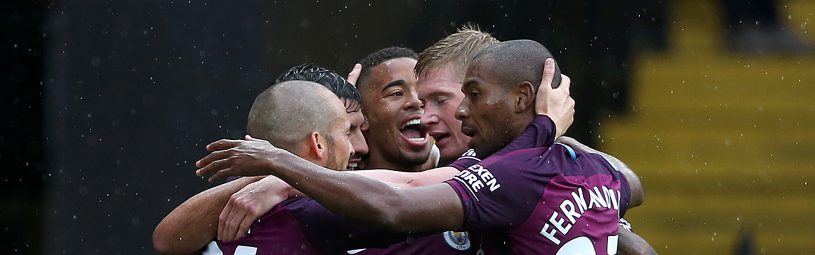 Manchester City's Gabriel Jesus (centre) celebrates scoring his side's third goal during the Premier League match at Vicarage Road, Watford.