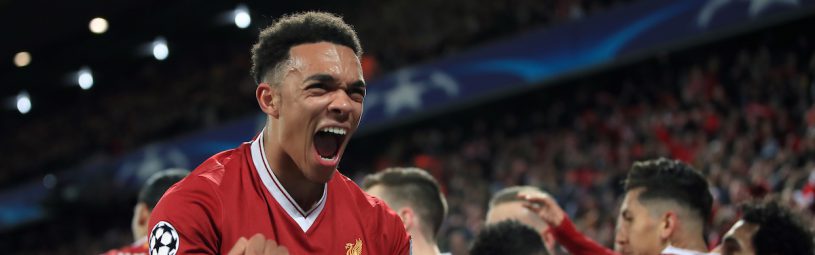 Liverpool's Trent Alexander-Arnold celebrates after Alex Oxlade-Chamberlain (background) scores his side's second goal of the game during the UEFA Champions League quarter final, first leg match at Anfield, Liverpool.